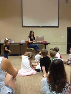 Miss Leah holding a story time.