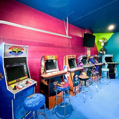 They installed a new, protected electrical panel to ensure the house could handle all of these arcade games inside of the converted garage.