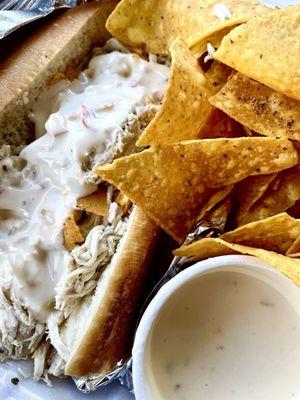 Chicken queso crunch sandwich and chips