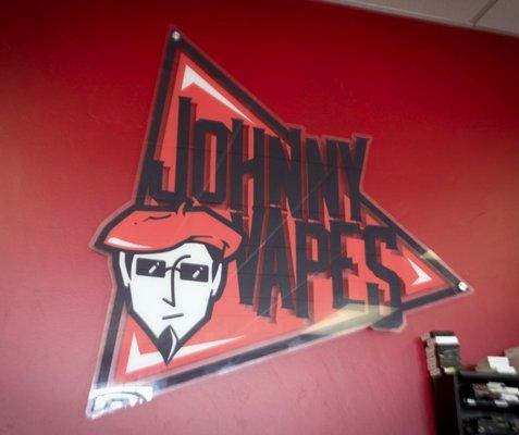 Johnny Vapes wall sign