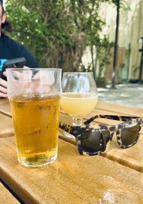 Hazy IPA (small glass) and Wheat Lager in larger glass