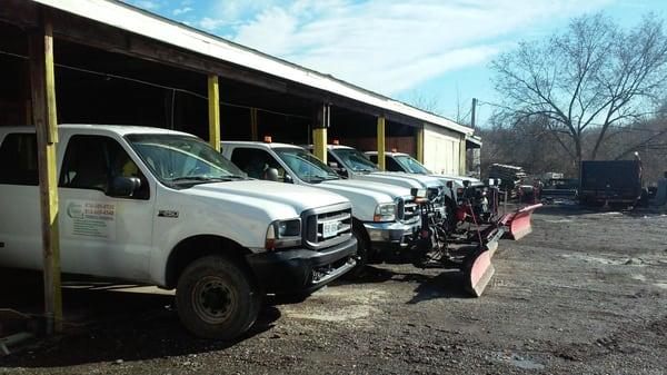 Our trucks, set up and ready for snow.