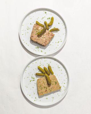 Delight in the sophisticated flavors of this meticulously prepared pâté, a perfect midday indulgence for a gourmet lunch experience in LA.