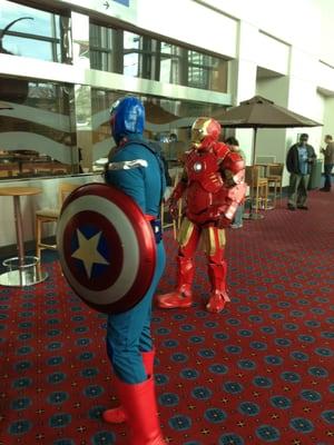 Chris Evans and Robert Downey Jr in costume.