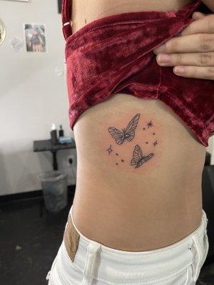 Butterfly rib cage tattoo