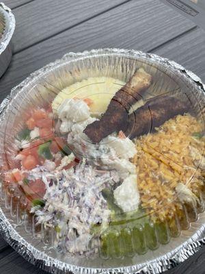 Buffet meal: fried fish, pico, rice and chicken, coleslaw, chimmichuri sauce, pineapple.