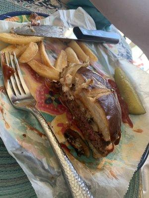 My wife's burger .  Cooked rare like she likes it!