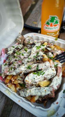 Steak and frittes with chimichurri and garlic truffle sauce