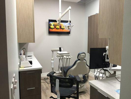 Clean and modern treatment room.