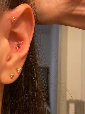 Forward helix and conch piercing