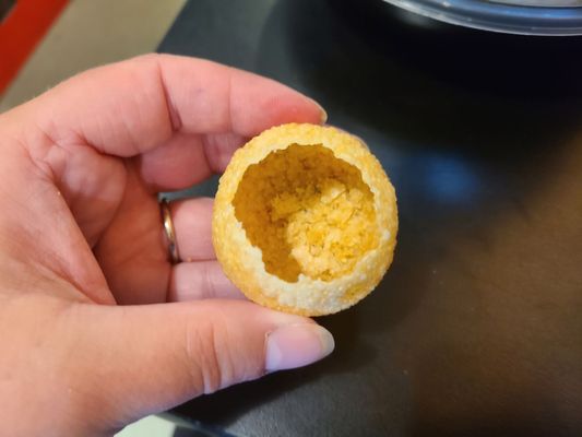 Hollow, crispy-fried puffed ball for Pani Puri