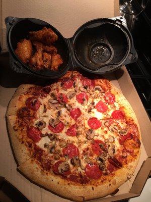 Pizza and wings. Was delivered hot!