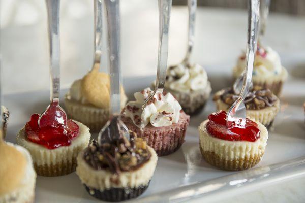 A variety of bite-sized cheesecake by She Imagined Sweets