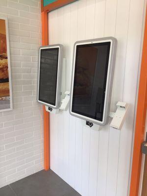 Walk-up digital ordering stations.