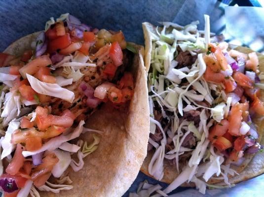 Fish Taco on the left, Kalua Pork taco on the right.