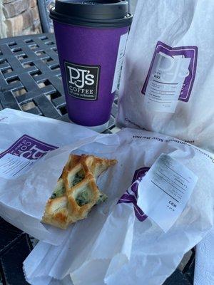 Coffee with spinach feta croissant and two orders of fresh beignets!