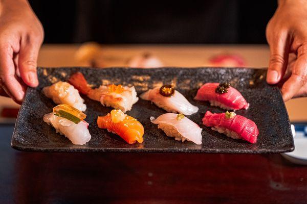 Indulge in our Omakase experience featuring 8 specialty nigiri sushi.