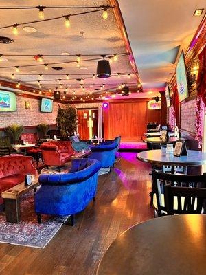 Rear room lounge for comfortable hang with friends, live jazz Tuesdays, etc.