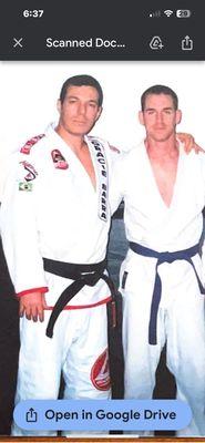 Gracie West instructor Tom McAuley (L) with Master Carlos Gracie Jr.