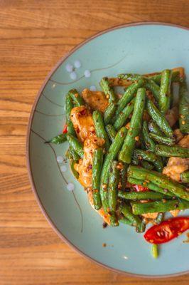 String Bean Chicken - Tender chicken breast white meat wok-fired with onions, sweet pepper, jalapeño, garlic, chili pepper and soy. Spicy.