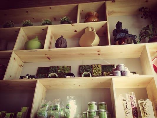 Lobby display with handmade soaps, bath salts and Buddha heads.