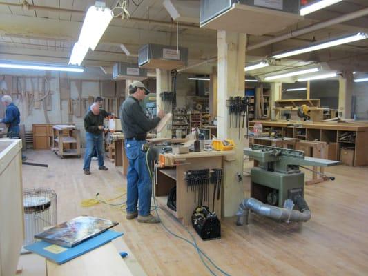 Working on their 1st project, a bench with thru tenons, mitre folded top, and Wenge pegs.