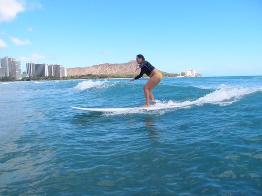 My daughter surfing on her first day