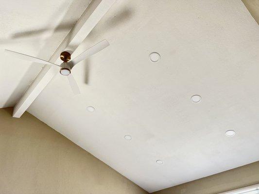 Master bedroom smart ceiling fan and dimmable LED ceiling lights installed.