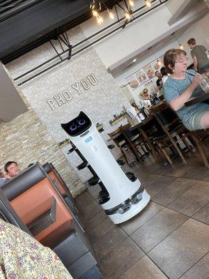 Robot waiters deliver food