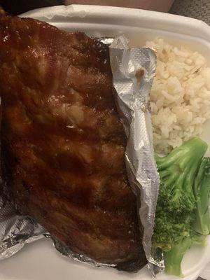 Half rack of ribs with white rice and broccoli