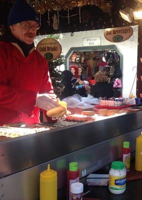 German sausage guy at work.  Different options of bratwurst available...so good.  Only here until Jan 4.