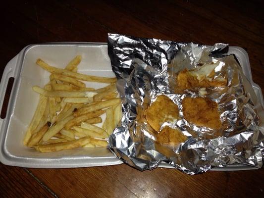 This was my fish "dinner" 4 small pieces of fish (luke warm) and a handfull of soggy cold fries.