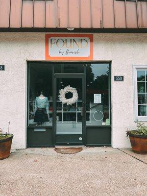 Our building is a cream colored stucco with a brown awning. You can see our coral + gold sign from ARB! Park anywhere on Jones Street.