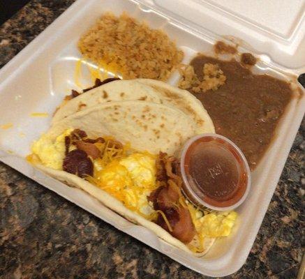 Bacon breakfast tacos with rice and beans