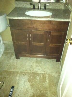 New 20" x 20" floor tile with new vanity