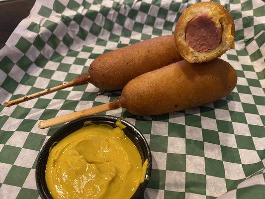 Mini corn dogs. They like half a hot dog! Bigger than mini!