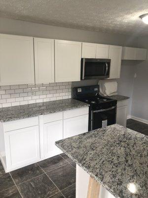 Backsplash countertops all done by him!