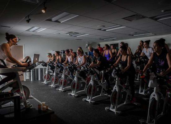 Reserve a bike in advance at www.grooveryde.com. Many of our classes fill. Cycle shoes are avail for rent and we have cages for sneakers.