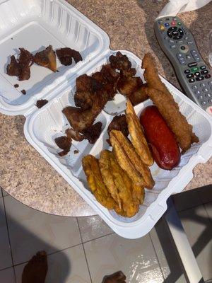 Fried plantains, Sausage & fried pork!!  Does this look like white Rice, beans with griot?