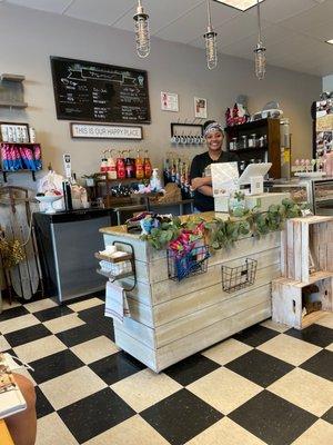 Miqell at the cash register. Great friendly barrista