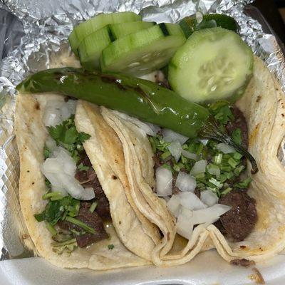 Tacos de cabeza (cow head tacos ) very good and tasty , the portions are perfect and fill you up . A little pricey but worth it .