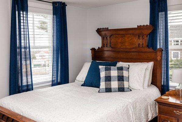 The Fo'c'sle offers a beautiful view of the Penobscot Bay with a full-size antique bed with a private bath and shower.