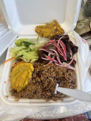 Fried goat. Rice & beans. & salad