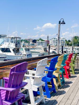 Colorful seating to enjoy watching the boats while you eat