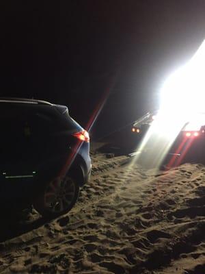 Absolute Towing pulling our CX-5 out of the dirt.