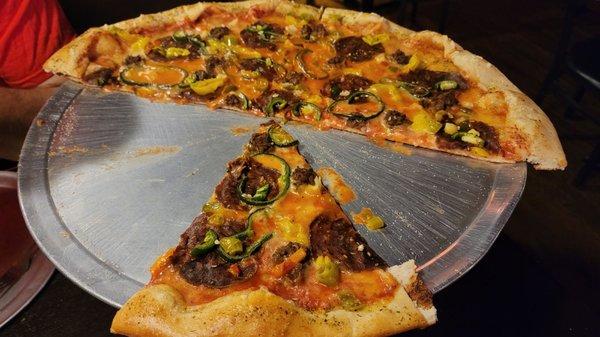 Vegan Inferno.  Crust is amazing by itself.. toppi gs transform this into vegan paradise.  Staff is friendly and attentive.