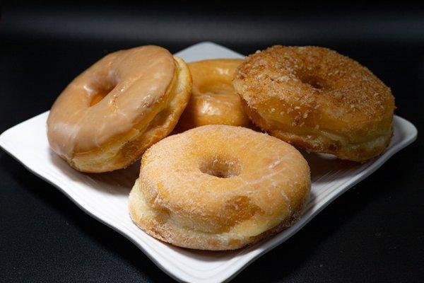 Maple, Glazed, cinnamon crumb, and sugar donuts