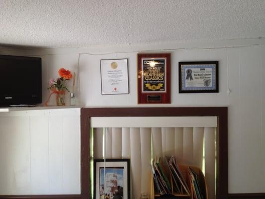 Awards on the wall.