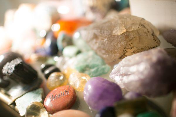 Precious stones and crystals for energy healing sessions.