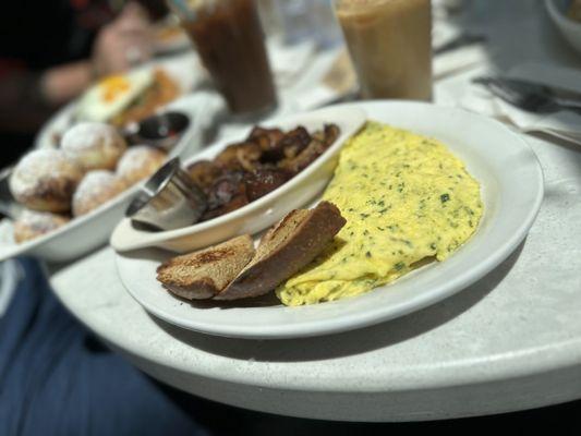 Herb omelette and side of potatoes